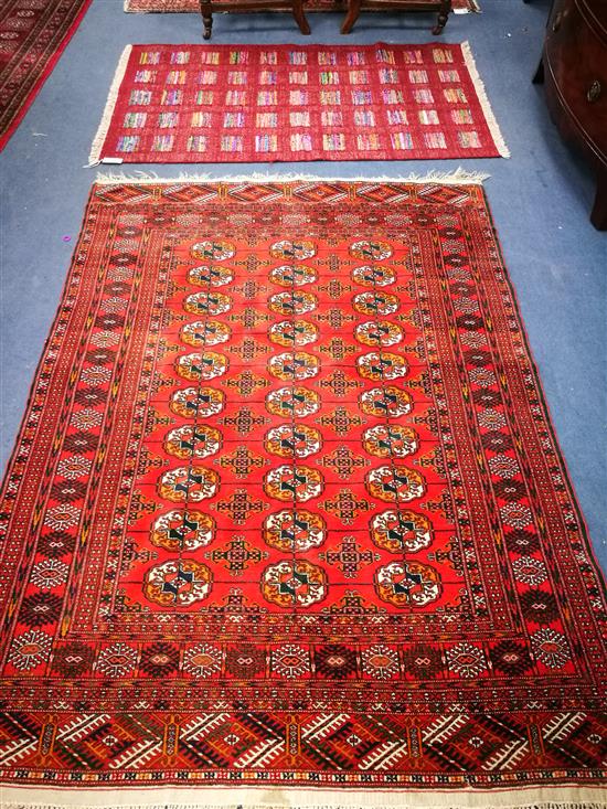 A Pakistan Bokhara rug and a small modern Kelim rug 186 x 140cm and 150 x 96cm